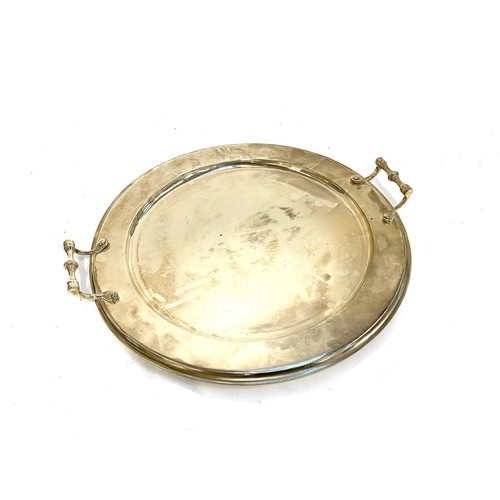 67 - A large .925 silver twin handled circular tray, 48.4ozt (1506g)