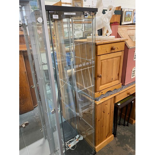 1103 - A modern glazed display cabinet, with LED lighting, 37x43x163cm (labelled cabinet 4)