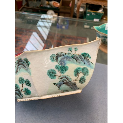 232 - A pair of Chinese porcelain shaped dishes, painted depicting figures in a landscape, turquoise inter... 