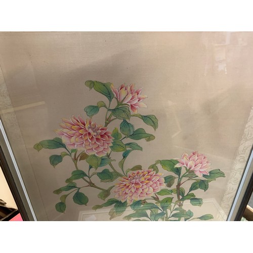 731 - A pair of Chinese paintings of silk depicting chrysanthemums, 32x27cm