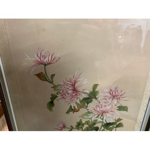 731 - A pair of Chinese paintings of silk depicting chrysanthemums, 32x27cm