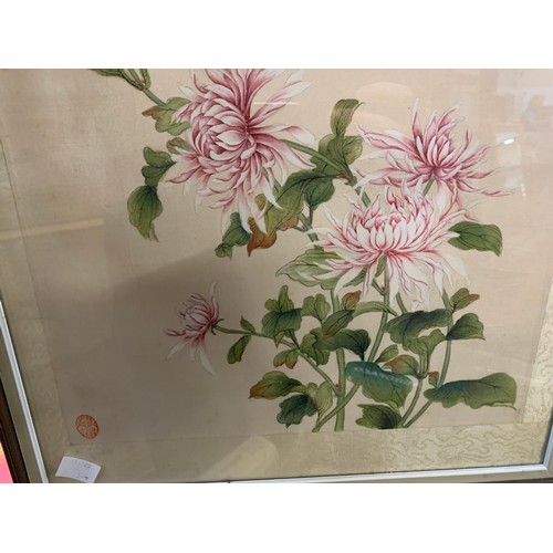 731 - A pair of Chinese paintings of silk depicting chrysanthemums, 32x27cm