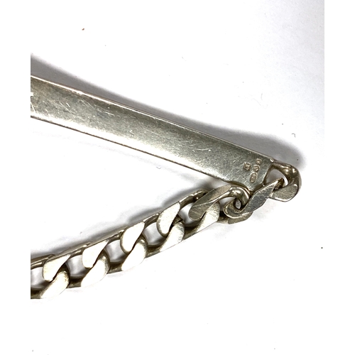 6 - A silver curb bracelet, blank name tag, import hallmarks for London, 1983, 10.8g