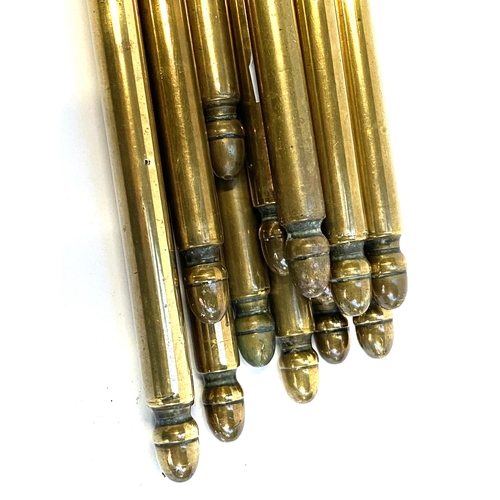 240 - A set of 13 brass stair rods with acorn terminals, each 61cmL