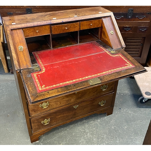 841 - A George III and later mahogany bureau, fall front over four graduating drawers, 87cmW