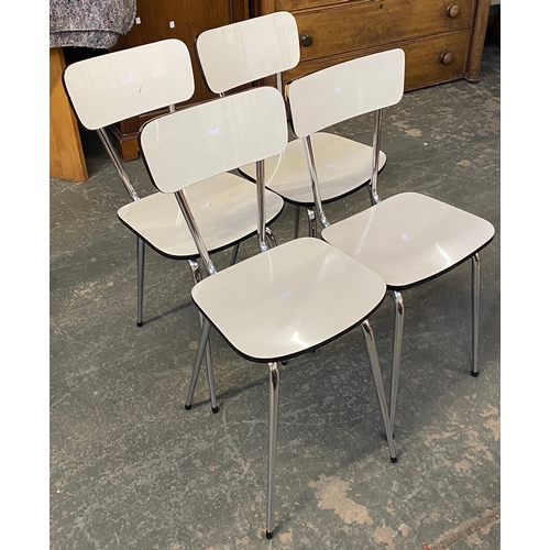 899 - A matched set of four mid century formica and chrome kitchen chairs; together with a matching draw l... 