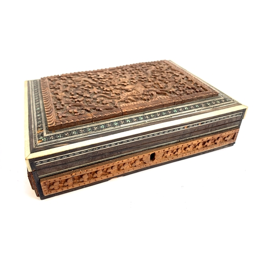 69 - FOREIGN COINAGE. An Indian box c. 8