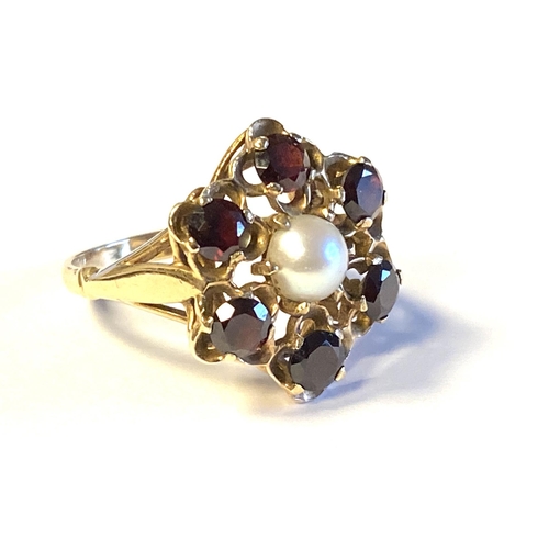 34 - A 9ct gold, garnet and pearl floral cluster form ring, size M 1/2, 3.5g