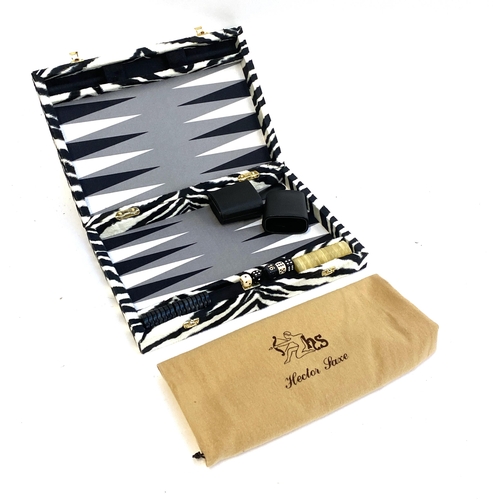 278 - A Hector Saxe luxury backgammon set, in zebra hide style case, 36.5cmW with dustbag