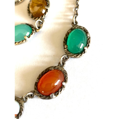 21 - A sterling silver necklace set with various multicoloured agate cabochons, moss agate, carnelian etc... 