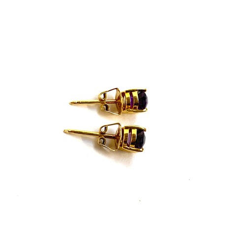 37 - A pair of 18ct gold and amethyst stud earrings, the amethyst approx. 7x5mm, gross weight 1.9g