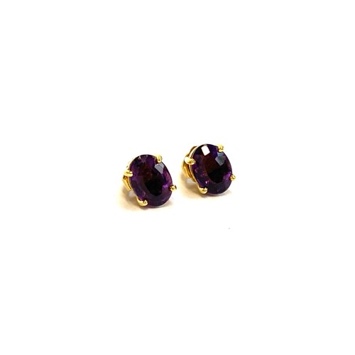 37 - A pair of 18ct gold and amethyst stud earrings, the amethyst approx. 7x5mm, gross weight 1.9g