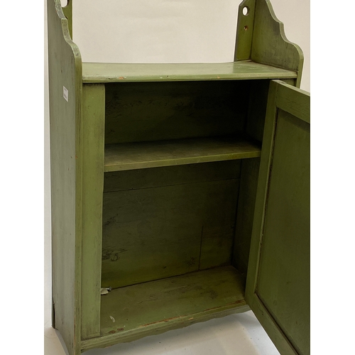 744 - A green folk art style painted pine spice cupboard, 38cmW