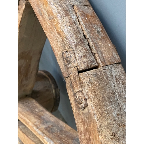 956 - A rustic wooden wagon wheel, 80cmD