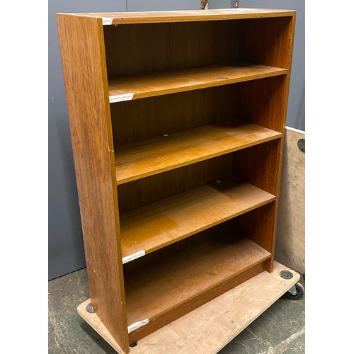 966 - A modern bookcase of four shelves