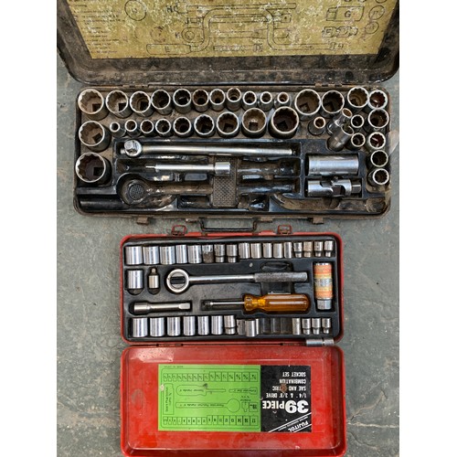 220 - Two metal toolboxes, together with two socket sets