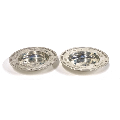 54 - A pair of silver pin dishes by Asprey & Co Ltd, engraved, each 8.4cm diameter, 2.9ozt