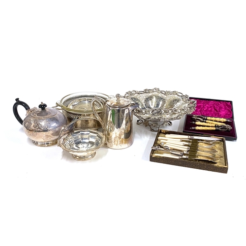 67 - A mixed lot of plated items to include a swing handed sweet meat dish, coffee pot, teapot, cased nut... 