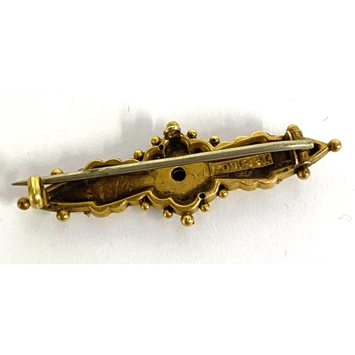 9 - A Victorian 15ct gold Etruscan revival bar brooch set with small diamond, 3.8cmL, gross weight 2g