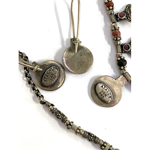 26 - A 925 silver tribal style necklace and matching earrings, marked 'Atasoy Van 990', gross weight 17.6... 