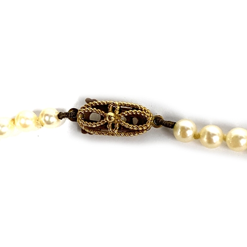 34 - A cultured pearl necklace with a 9ct gold clasp, the pearls approx. 4.5mm diameter, 36cmL unclasped