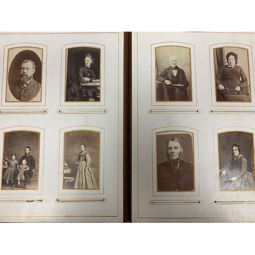 412 - A large Victorian photo album, approx. 17 double sided pages