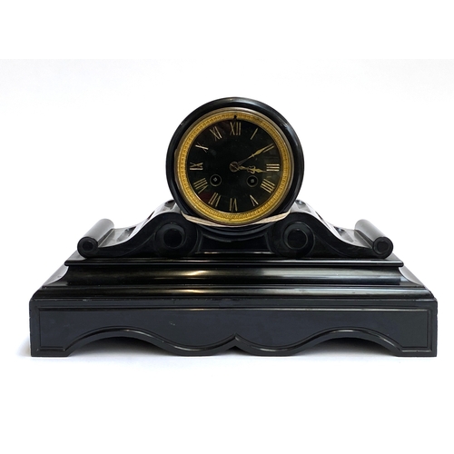 99 - A slate mantel clock with Roman numerals, striking on a bell, 40cmW