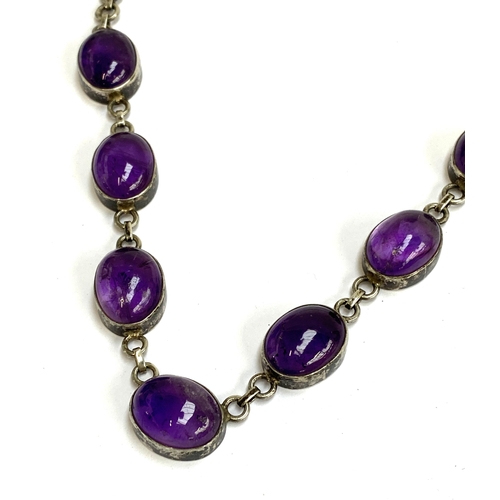 40 - A silver and amethyst cabochon necklace, 43cmL unclasped, 35.8g