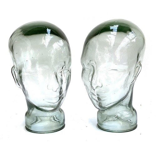 414 - Two glass hat display heads, 28cmH