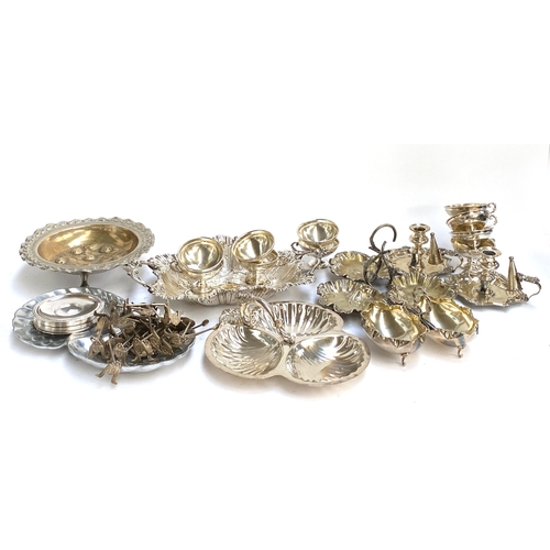 86 - A mixed lot of electroplated items, to include hors d'oeuvres dishes, sweet meat dishes, two candle ... 