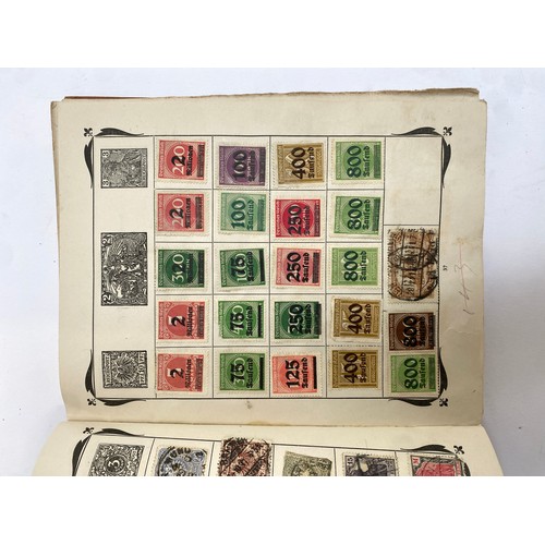 398 - A Stanley Gibbons stamp album containing mostly British infinitives and other world stamps, together... 