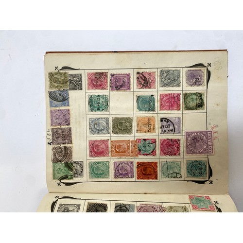 398 - A Stanley Gibbons stamp album containing mostly British infinitives and other world stamps, together... 