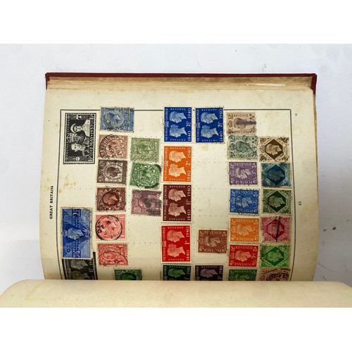 398 - A Stanley Gibbons stamp album containing mostly British infinitives and other world stamps, together... 