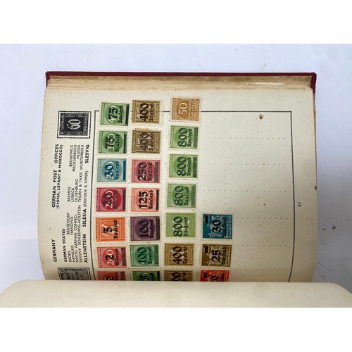 398 - A Stanley Gibbons stamp album containing mostly British infinitives and other world stamps, together... 