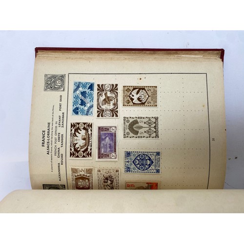 398 - A Stanley Gibbons stamp album containing mostly British infinitives and other world stamps, together... 