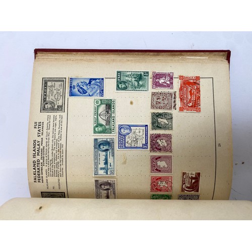 398 - A Stanley Gibbons stamp album containing mostly British infinitives and other world stamps, together... 