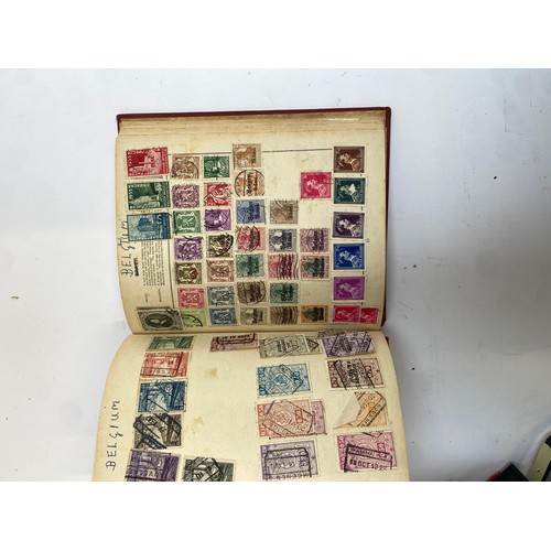 398 - A Stanley Gibbons stamp album containing mostly British infinitives and other world stamps, together... 