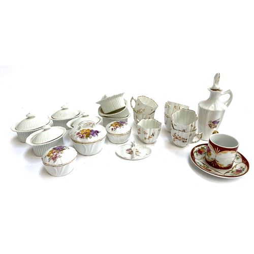 404 - A quantity of dolls part tea services, to include Mehun Depose, together with a floral coffee can an... 