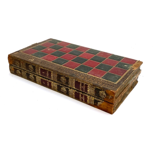 407 - A leather vintage backgammon/chess board, with pieces, in the form of two leather bound volumes of t... 