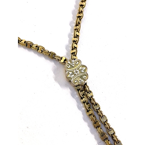 53 - An antique gold fancy link chain with engraved slider and tassel pendant, tests as 9ct or higher, 45... 