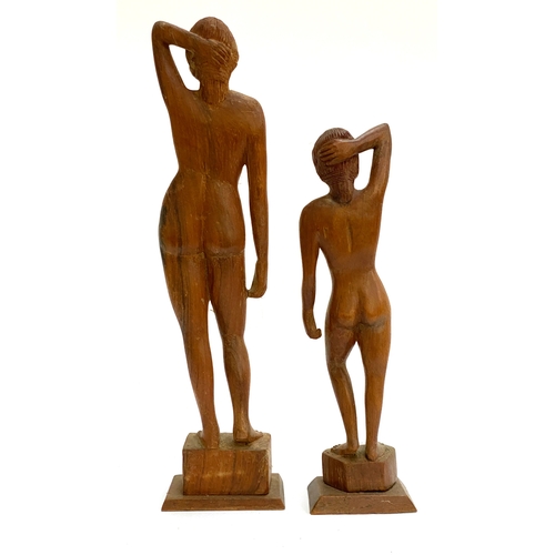 236 - Two 20th century female nude studies in carved wood, 40cmH and 31.5cmH