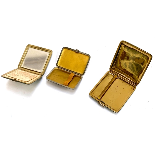 246 - Two early 20th century shagreen cigarette cases, the larger 9cmW, and a shagreen compact, 7.8cmW (3)