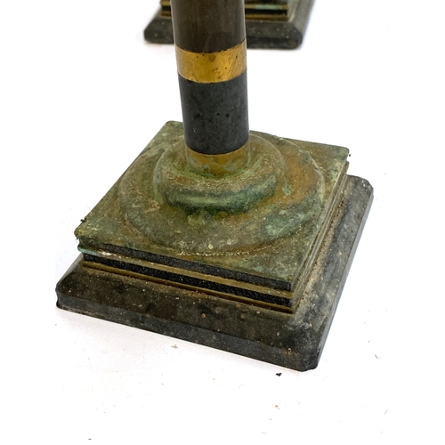 247 - A pair of unusual brass and slate candlesticks on square plinth bases, 21cmH