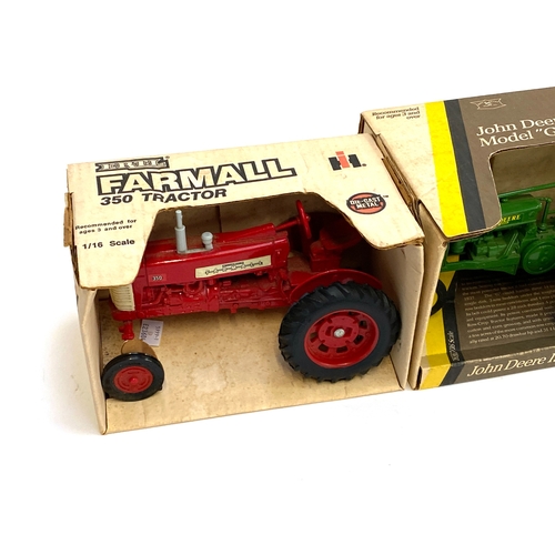 256 - An Ertl Farmall 350 tractor die cast metal 1/16 scale model; together with an Ertl 1/16 scale John D... 