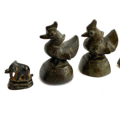 331 - A set of Burmese bronze opium weights, all birds with one elephant, the tallest 7cmH