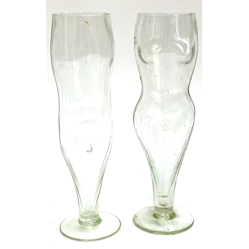 136 - A mixed lot of shaped glassware, mainly novelty, to include a pair of wine glasses in the shape of n... 