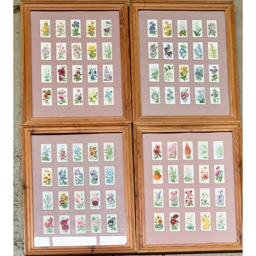 714 - A large quantity of framed and glazed cigarette cards to include Player's Dickens, Cats, Thackeray, ... 