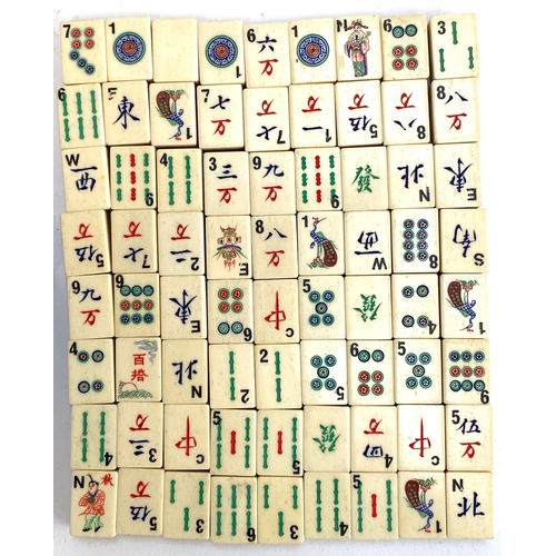 342 - An early 20th century mahjong set, bone and bamboo pieces, together with a set of racks, 152 pieces