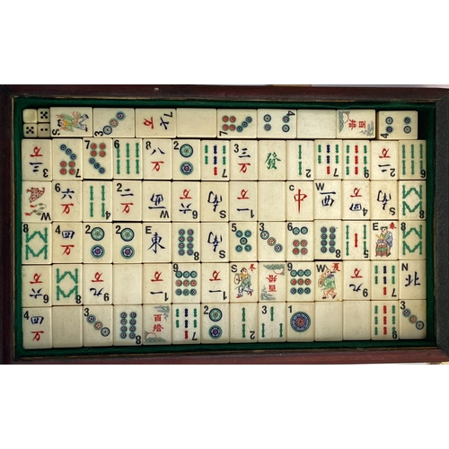 342 - An early 20th century mahjong set, bone and bamboo pieces, together with a set of racks, 152 pieces