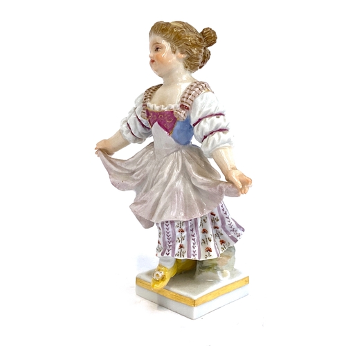 194 - A late 19th/early 20th century Meissen porcelain figure of a young dancing girl, blue underglaze cro... 